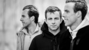 Tallon Griekspoor met zijn broers Scott en Kevin Griekspoor.